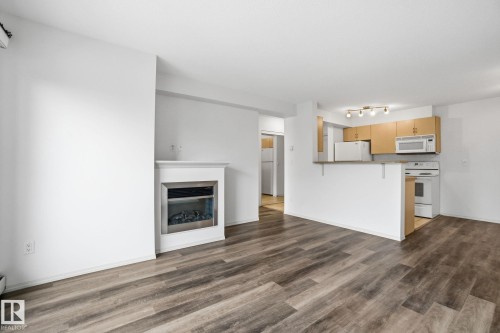 424 17011 67 Avenue, Edmonton, AB - Indoor Photo Showing Other Room With Fireplace