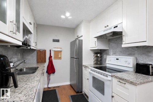 6617 180 Street, Edmonton, AB - Indoor Photo Showing Kitchen With Double Sink