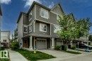 Contemporary multi-story townhome featuring gray siding and white trim - 67 603 Watt Boulevard, Edmonton, AB  - Outdoor With Facade 