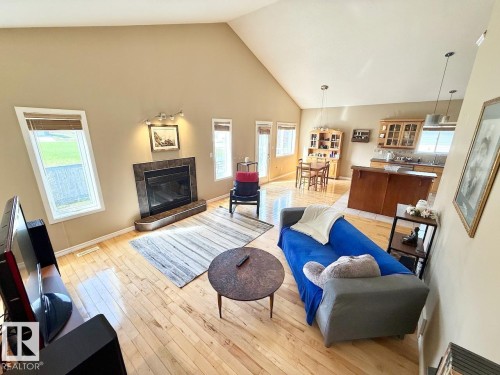 4503 Spruce Avenue, Boyle, AB - Indoor Photo Showing Living Room With Fireplace