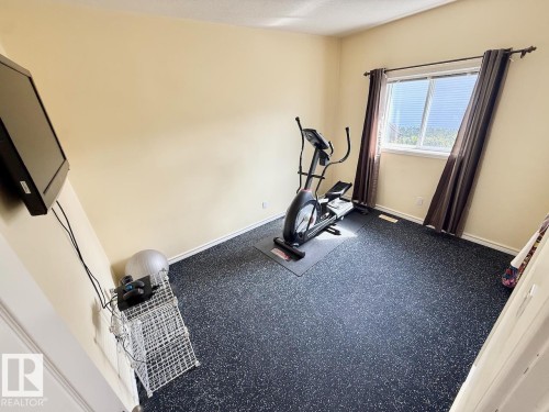 4503 Spruce Avenue, Boyle, AB - Indoor Photo Showing Gym Room