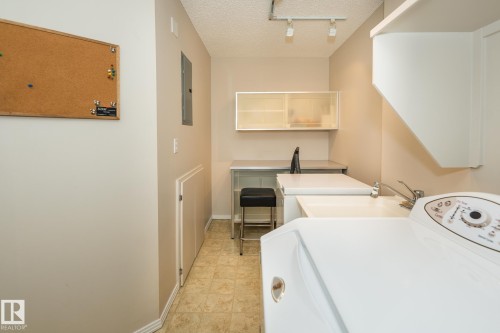 210 2420 108 Street, Edmonton, AB - Indoor Photo Showing Laundry Room