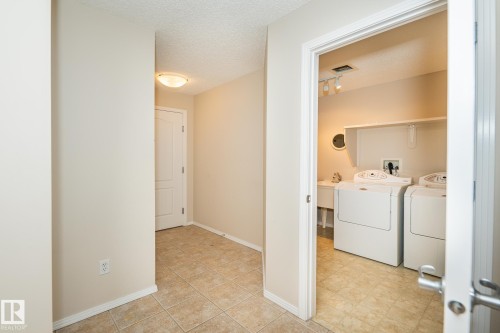 210 2420 108 Street, Edmonton, AB - Indoor Photo Showing Laundry Room