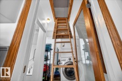 Pull-down attic access ladder with wood-finish framing - 