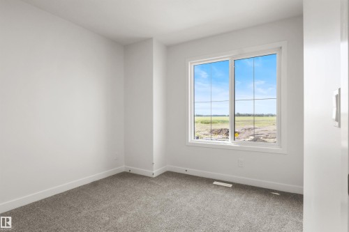 2376 Muckleplum Way Sw, Edmonton, AB - Indoor Photo Showing Other Room