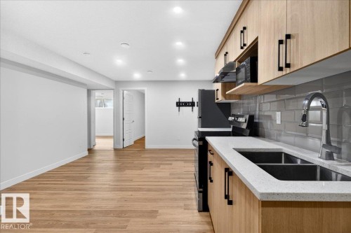 4872 Kinney Road, Edmonton, AB - Indoor Photo Showing Kitchen With Double Sink