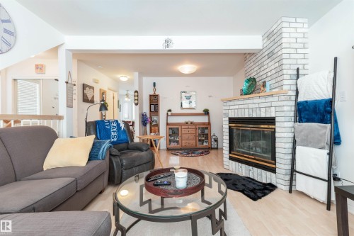 25 3645 145 Avenue, Edmonton, AB - Indoor Photo Showing Living Room With Fireplace