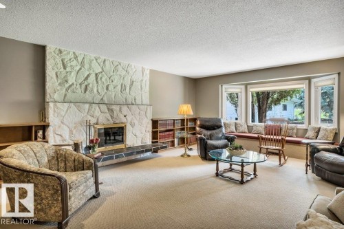 260 Windermere Drive, Edmonton, AB - Indoor Photo Showing Living Room With Fireplace