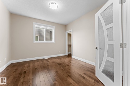 Hardwood flooring throughout - 16543 132 Street, Edmonton, AB - Indoor Photo Showing Other Room