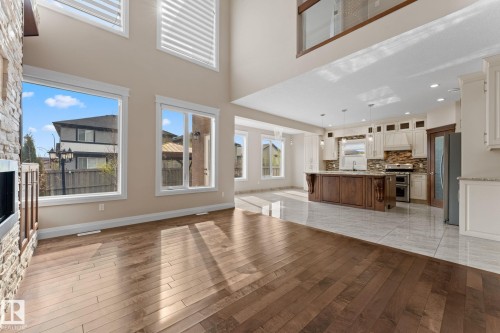 Spacious open-concept interior featuring high ceilings and abundant natural light - 16543 132 Street, Edmonton, AB - Indoor Photo Showing Other Room