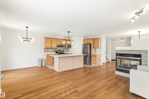 2550 Rabbit Hill Road, Edmonton, AB - Indoor Photo Showing Other Room With Fireplace