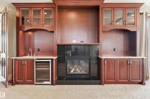 1004 Hollands Point(E), Edmonton, AB - Indoor With Fireplace