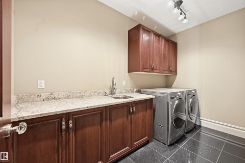 1004 Hollands Point(E), Edmonton, AB - Indoor Photo Showing Laundry Room