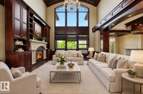 Virtually Staged - 1004 Hollands Point(E), Edmonton, AB - Indoor Photo Showing Living Room With Fireplace