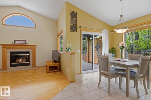 70 Eastcott Drive, St. Albert, AB - Indoor Photo Showing Dining Room With Fireplace