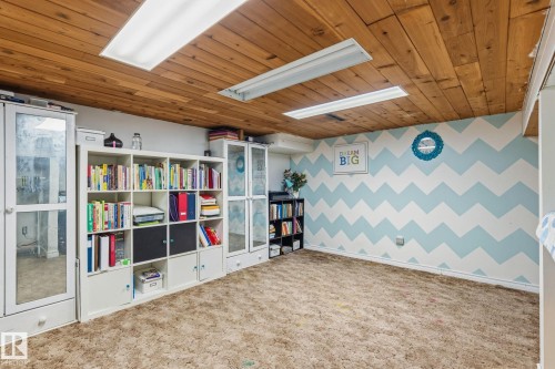 Wood-paneled ceiling with recessed lighting fixtures - 15232 120 Nw, Edmonton, AB 