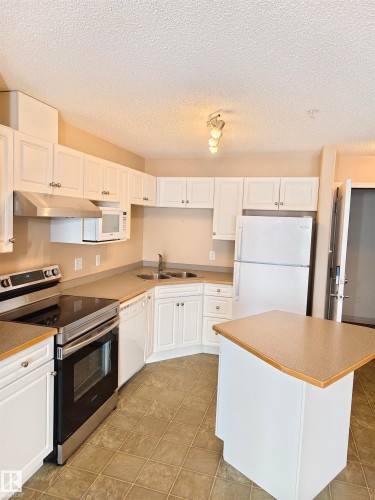 209 7511 171 Street Nw, Edmonton, AB - Indoor Photo Showing Kitchen With Double Sink