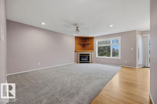 10 Coloniale Court, Beaumont, AB - Indoor With Fireplace