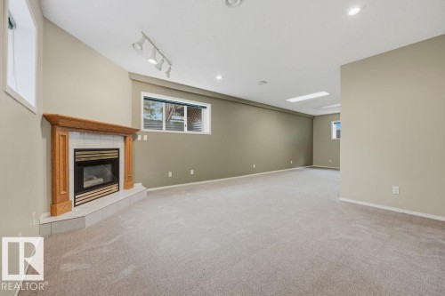 10 Coloniale Court, Beaumont, AB - Indoor With Fireplace