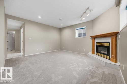 10 Coloniale Court, Beaumont, AB - Indoor With Fireplace
