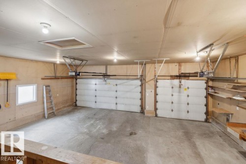 10 Coloniale Court, Beaumont, AB - Indoor Photo Showing Garage