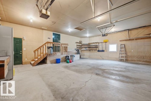10 Coloniale Court, Beaumont, AB - Indoor Photo Showing Garage