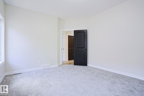 Room featuring light gray carpeting and white walls - 82 Meadowview Point(E), Sherwood Park, AB - Indoor Photo Showing Other Room