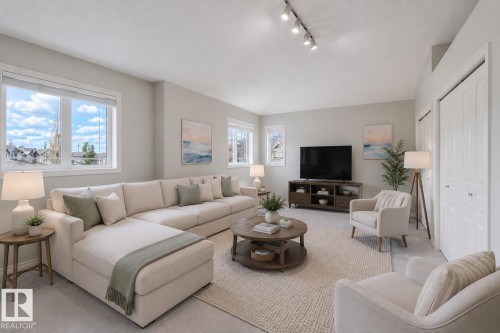 Living space featuring light gray walls and white trim - 3534 Mclean Crescent, Edmonton, AB - Indoor Photo Showing Living Room