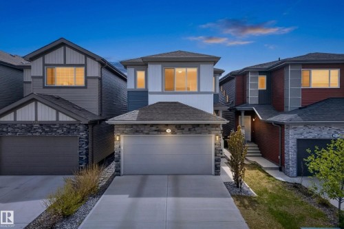Contemporary two-story residence featuring a light gray and blue-toned facade - 9309 Pear Link Link, Edmonton, AB - Outdoor