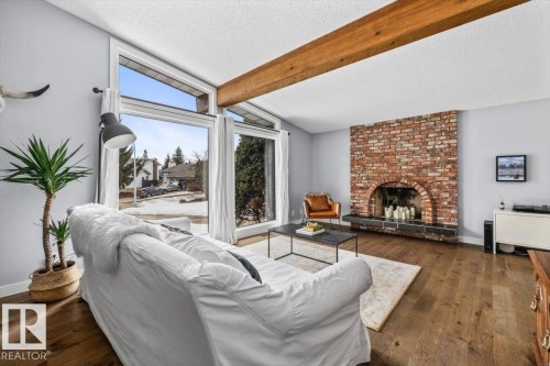 11427 35 Avenue, Edmonton, AB - Indoor Photo Showing Living Room With Fireplace