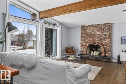 11427 35 Avenue, Edmonton, AB - Indoor Photo Showing Living Room With Fireplace