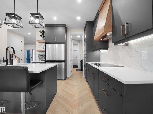 7214 Kiviaq Link, Edmonton, AB - Indoor Photo Showing Kitchen With Upgraded Kitchen