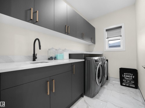 7214 Kiviaq Link, Edmonton, AB - Indoor Photo Showing Laundry Room