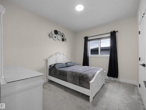 7214 Kiviaq Link, Edmonton, AB - Indoor Photo Showing Bedroom