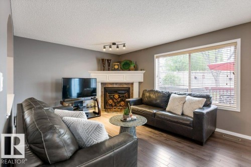 109 Erin Ridge Drive, St. Albert, AB - Indoor Photo Showing Living Room With Fireplace