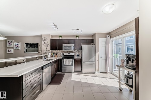 53 4850 Terwillegar Common, Edmonton, AB - Indoor Photo Showing Kitchen With Double Sink
