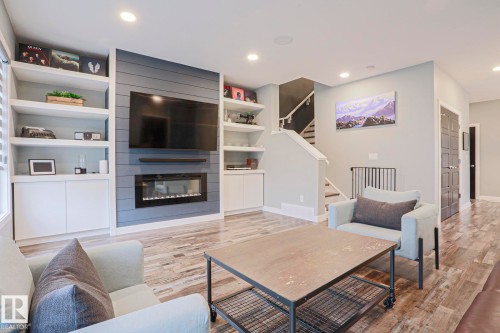 661 Lewis Greens Drive, Edmonton, AB - Indoor Photo Showing Living Room With Fireplace