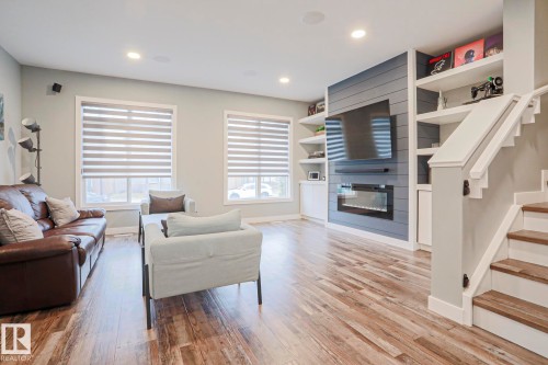 661 Lewis Greens Drive, Edmonton, AB - Indoor Photo Showing Living Room With Fireplace