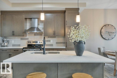 777 Berg Loop, Leduc, AB - Indoor Photo Showing Kitchen With Double Sink With Upgraded Kitchen
