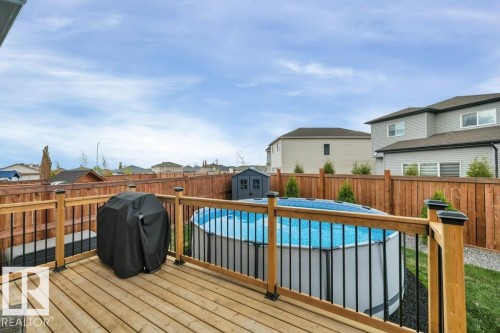 777 Berg Loop, Leduc, AB - Outdoor With Above Ground Pool With Deck Patio Veranda