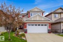 Red siding exterior with contrasting beige gables and trim - 1359 Westerra Drive, Stony Plain, AB  - Outdoor With Facade 