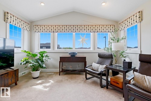 Bright interior space featuring a vaulted ceiling with recessed lighting - 1359 Westerra Drive, Stony Plain, AB - Indoor Photo Showing Other Room