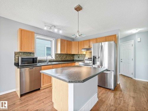 6424 1A Avenue, Edmonton, AB - Indoor Photo Showing Kitchen With Stainless Steel Kitchen With Double Sink