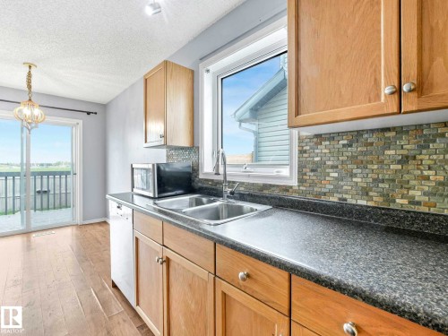 6424 1A Avenue, Edmonton, AB - Indoor Photo Showing Kitchen With Double Sink