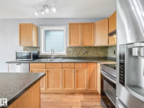 6424 1A Avenue, Edmonton, AB - Indoor Photo Showing Kitchen With Stainless Steel Kitchen With Double Sink