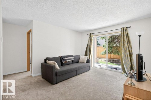 111 11218 80 Street, Edmonton, AB - Indoor Photo Showing Living Room