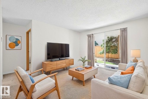111 11218 80 Street, Edmonton, AB - Indoor Photo Showing Living Room