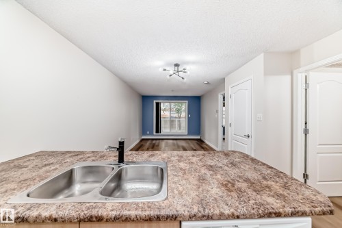 108 12838 65 Street, Edmonton, AB - Indoor Photo Showing Kitchen With Double Sink
