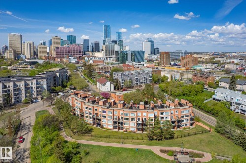 Curved residential building featuring multiple private balconies - 108 10105 95 Street, Edmonton, AB - Outdoor With View