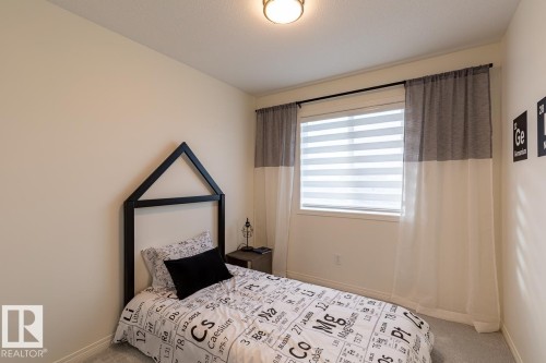 150 Pierwyck Loop, Spruce Grove, AB - Indoor Photo Showing Bedroom